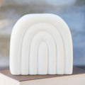 Brûle-parfum Arch en dolomite beige au design arrondi en forme d’arche